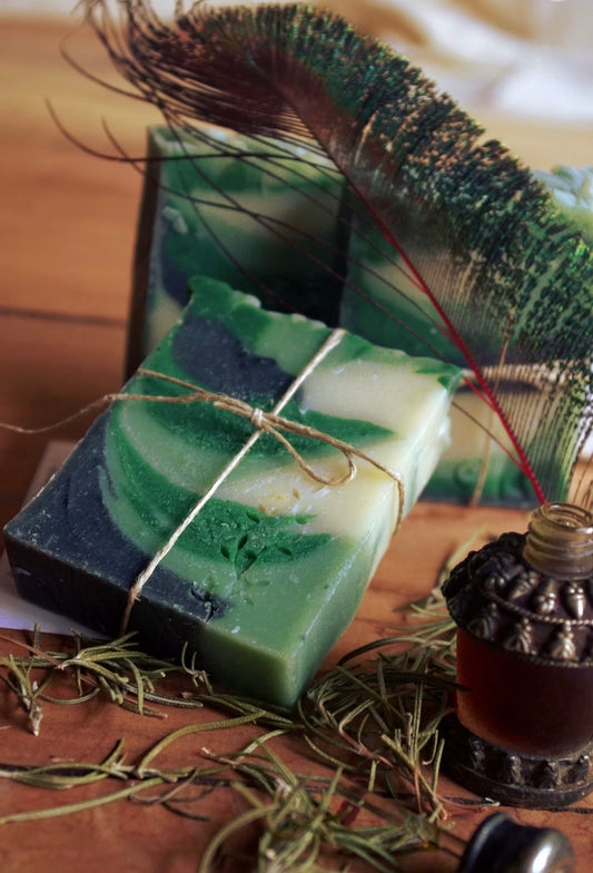 Handmade soap with natural elements on a wooden surface