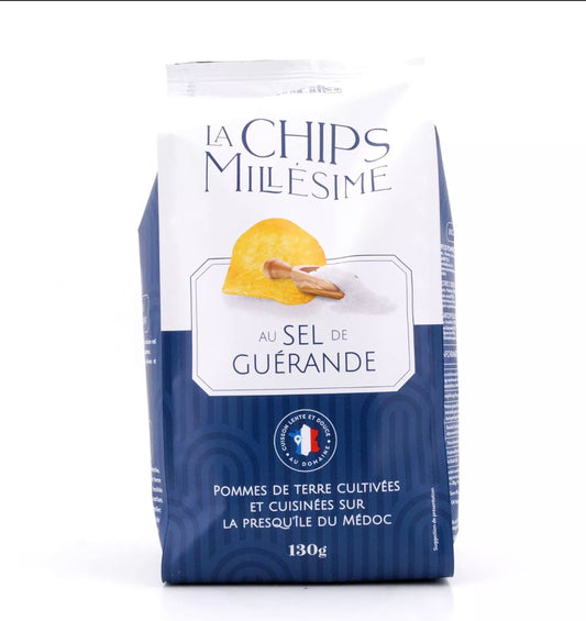 Blue packaging of 'La Chips Millésime' with a potato chip on a white background