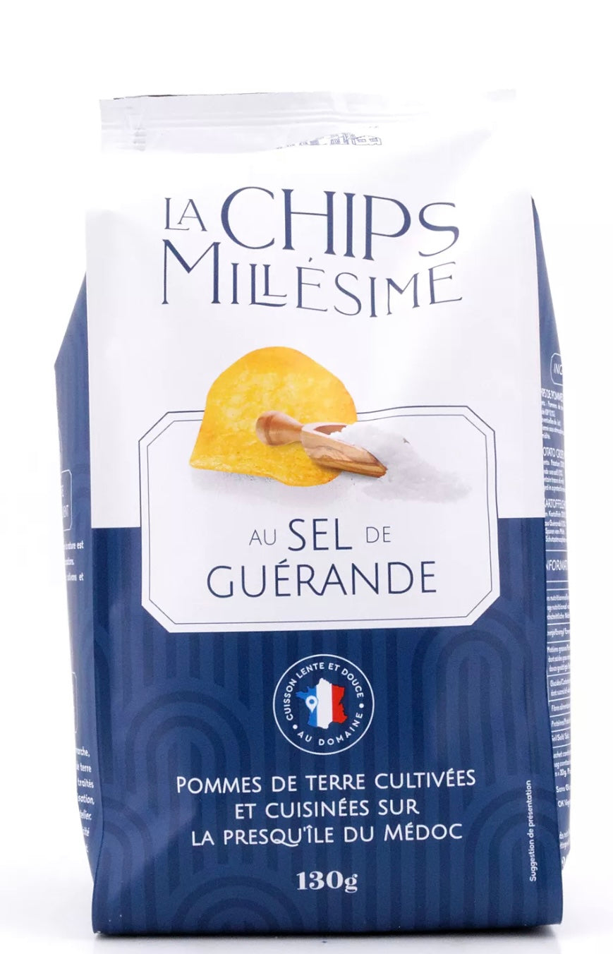 Packaging of La Chips Millesime with a blue and white design, featuring a potato chip and text.